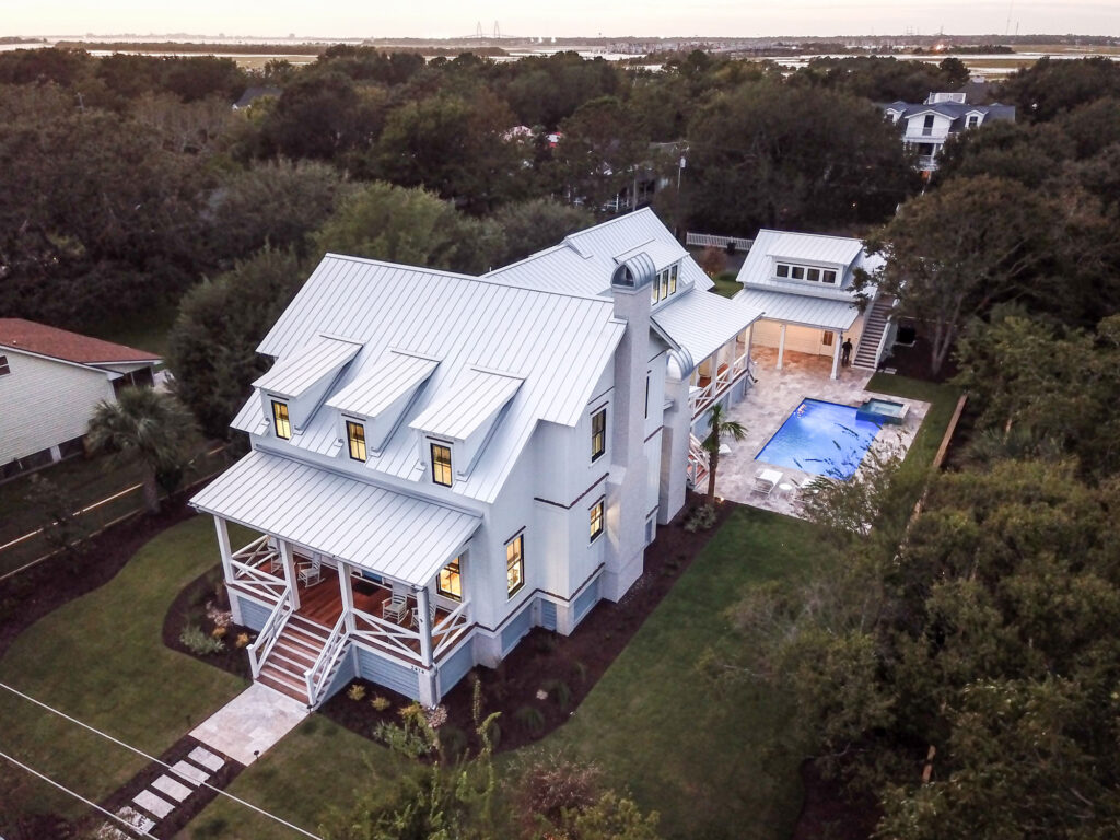 aerial view of beautiful home with a pool - luxury residential architects