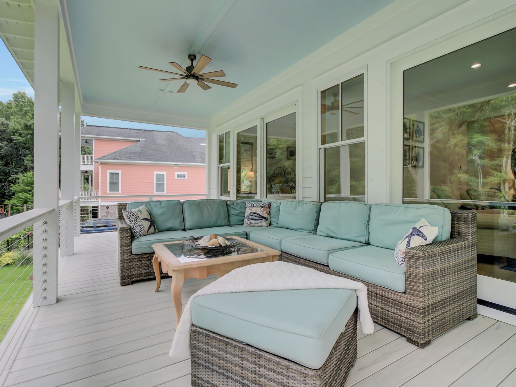outside porch furniture couch and table - the coastal creek design difference charleston, SC