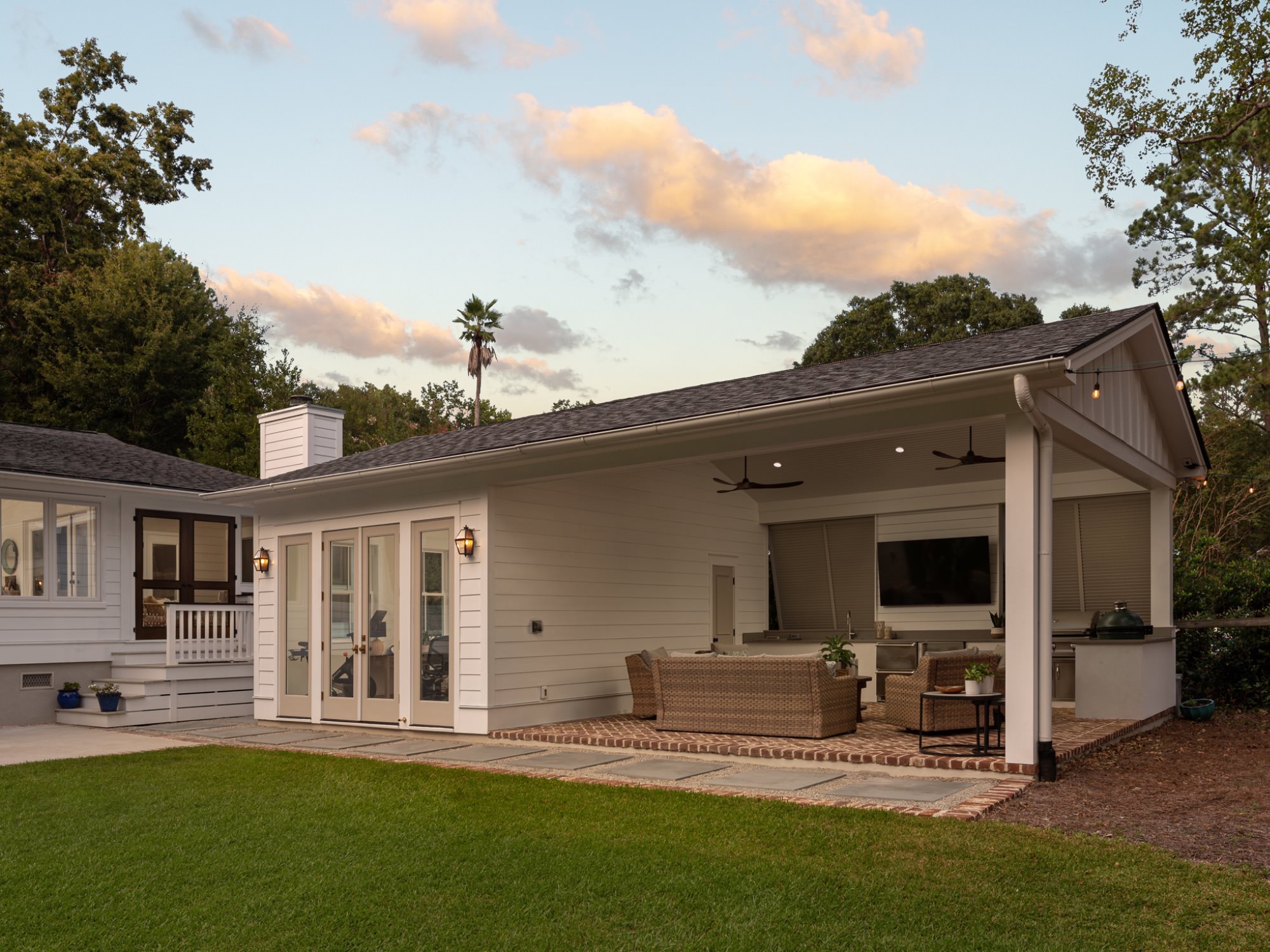view of poolhouse behind a house, charleston sc