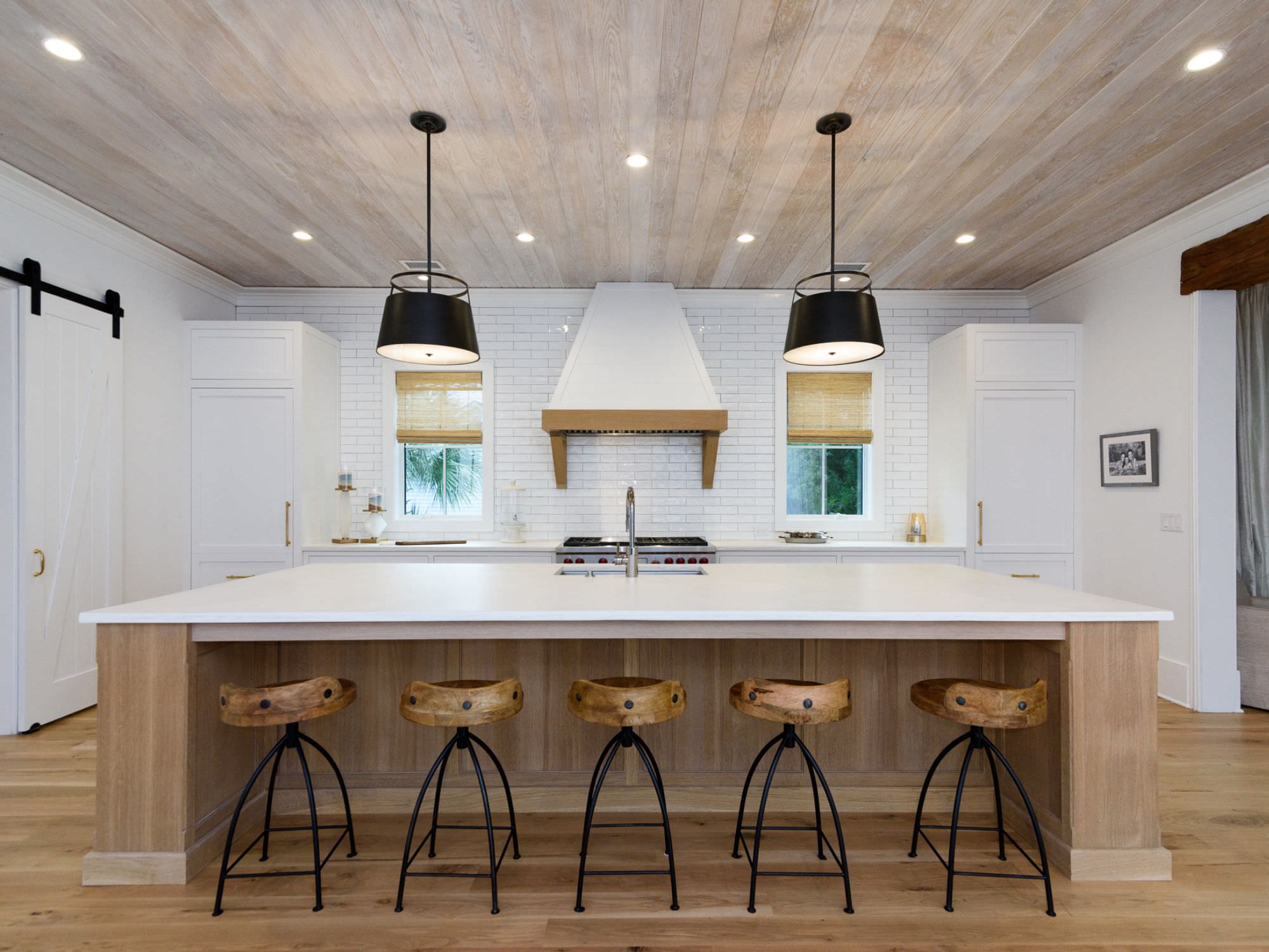 renovated kitchen island and bar stools