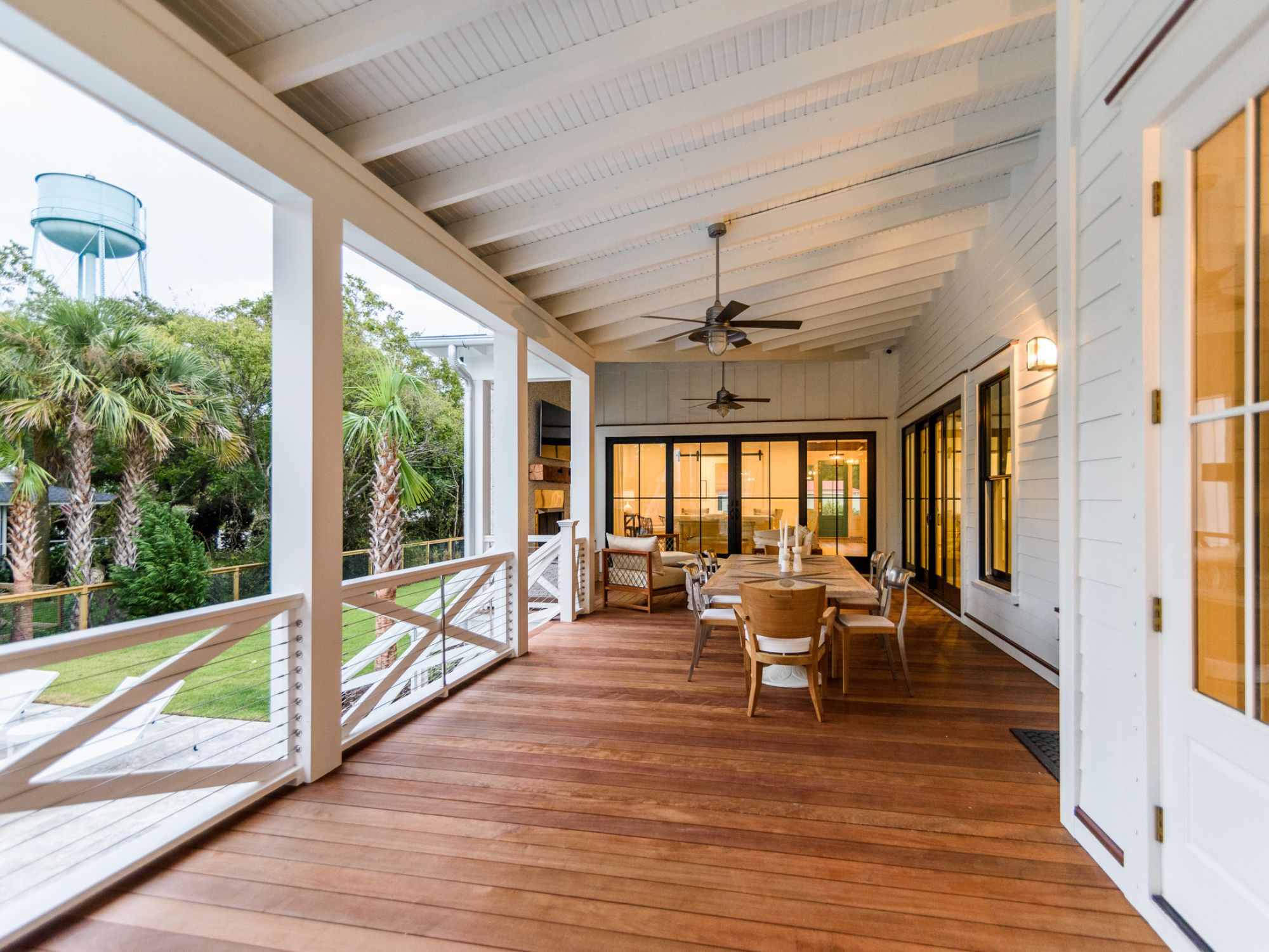 big back porch with porch table and chairs