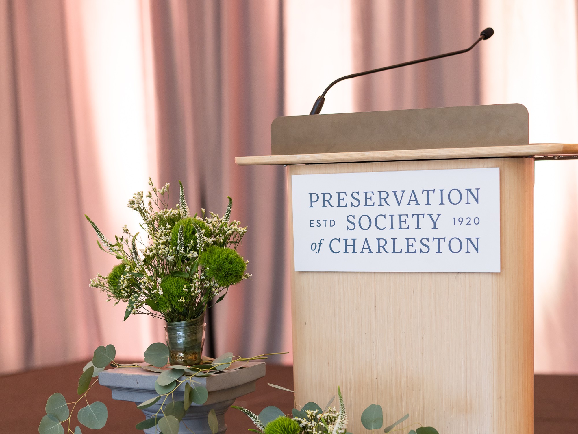podium at the carolopolis awards in charleston, SC - award winning architects