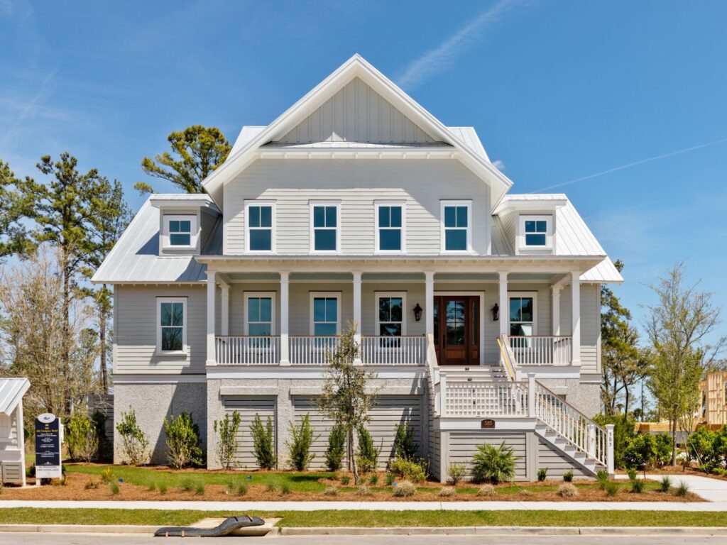 two story home with large staircase and front porch in charleston, SC - Elevated house plans for flood zones