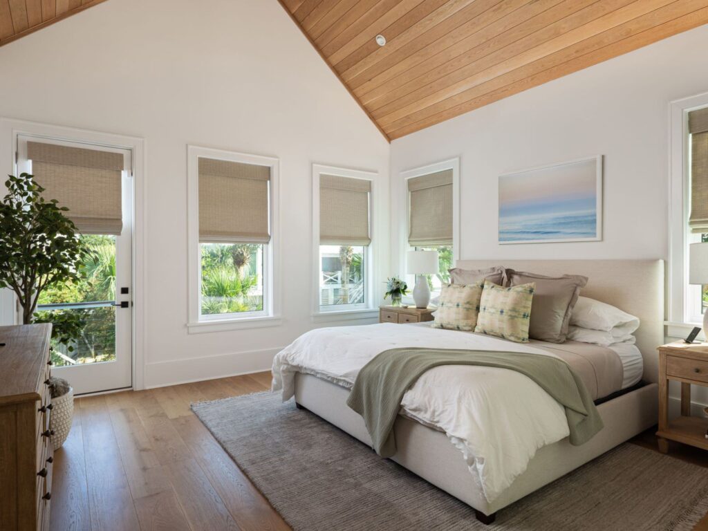 master bedroom with bed, nightstand and dresser - room addition