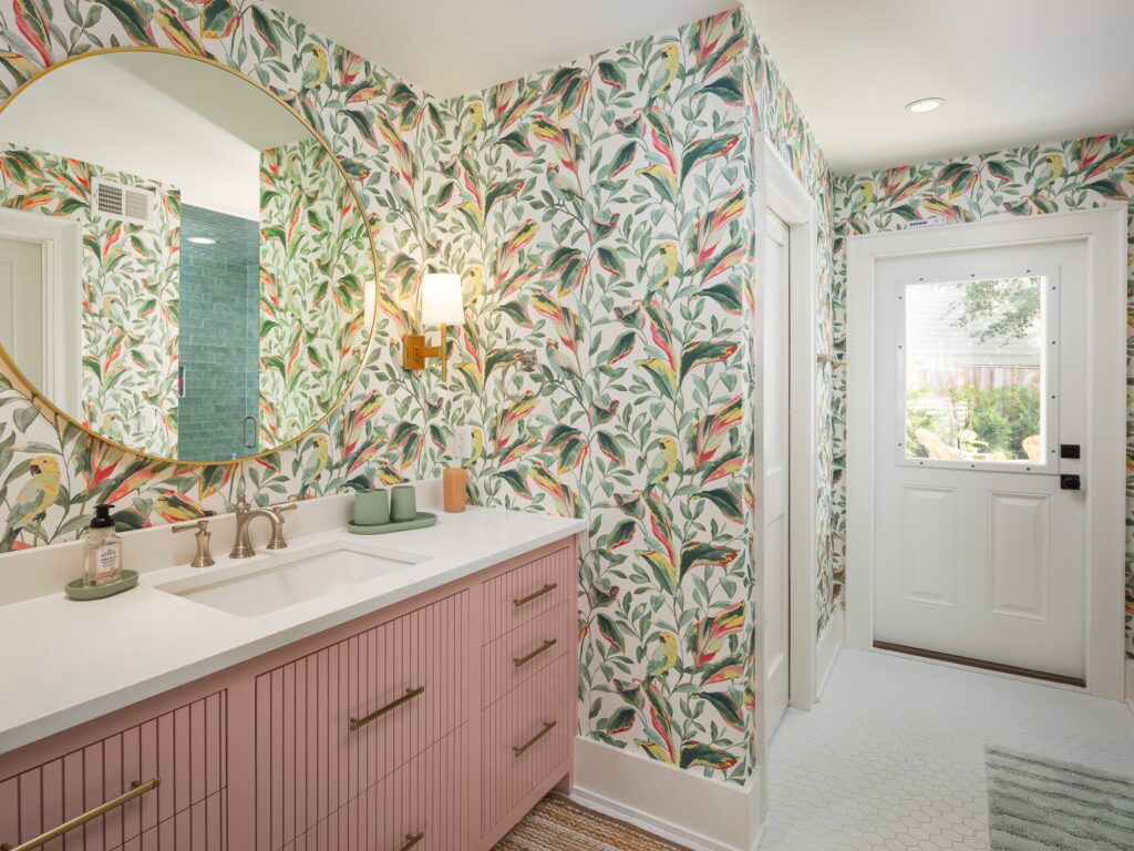 cute wallpaper, mirror and pink vanity - architect vs. interior designer, charleston, SC
