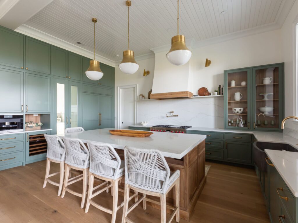 beautiful kitchen with blue green cabinets, white island and rope chairs - how to plan a kitchen remodel, charleston, SC