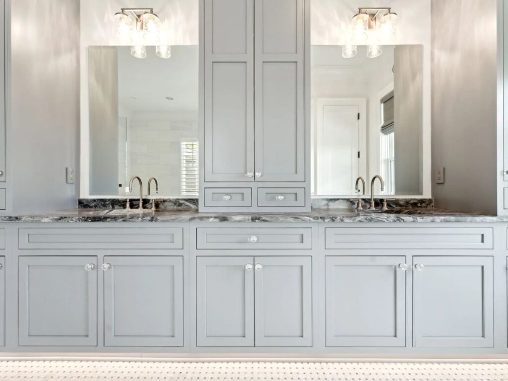 super long gray bathroom vanity with plenty of cabinets