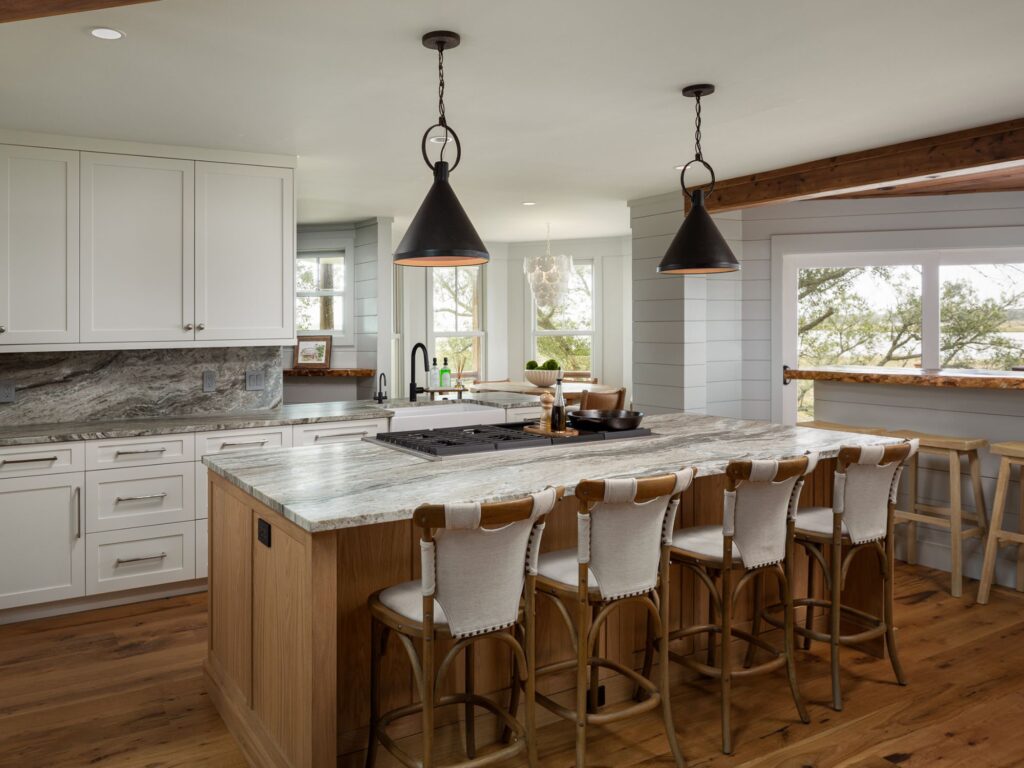 rustic looking kitchen island with chairs