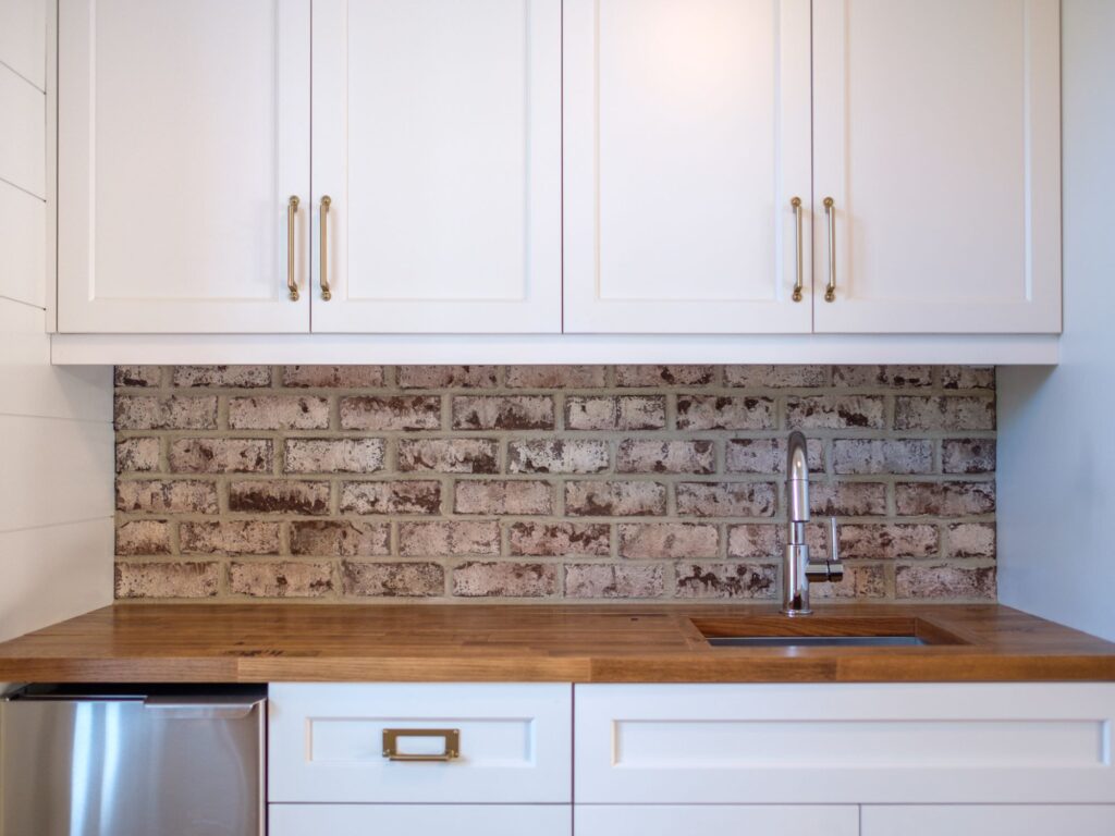 sink and counter with brick backsplash - home renovation checklist, charleston, SC