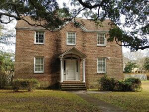 brown two story home - infill housing